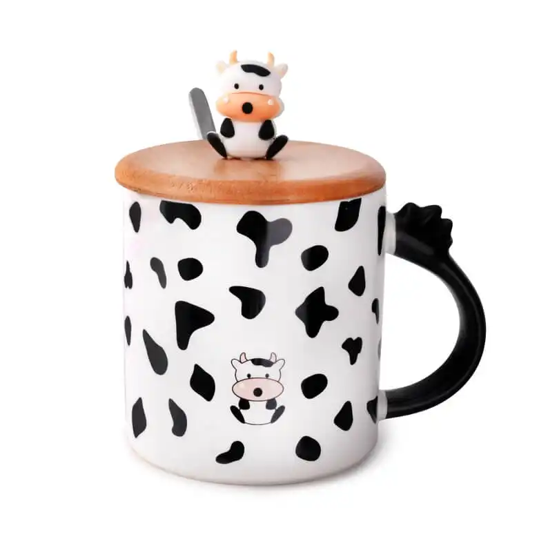 This Adorable Milk Cow Mug with Lid and Spoon