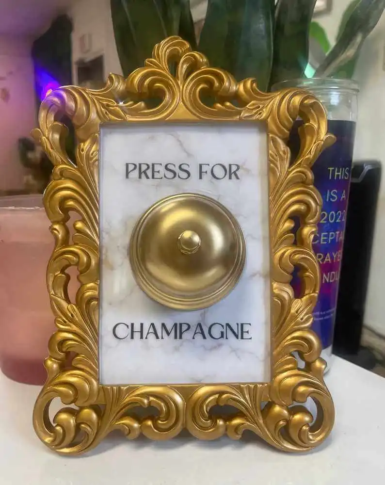 A Funny "Press For Champagne" Sign
